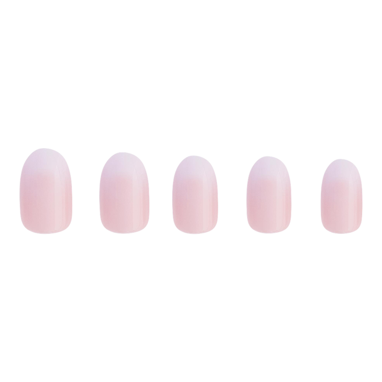 Creamer Press-On Nails Uñas postizas degradado suave de blanco sobre nude.