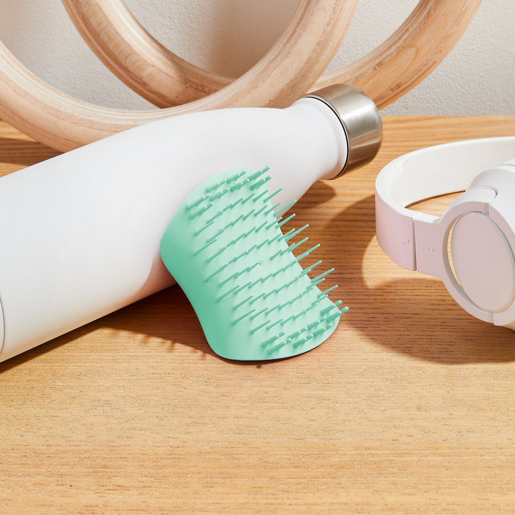 The Scalp Exfoliator & Massager Cepillo limpia el cuero cabelludo